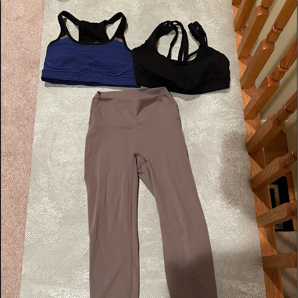 Two Lululemon Sports Bras size 6 with a Amazon legging size 4